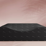 Black box with a pattern on a pink background