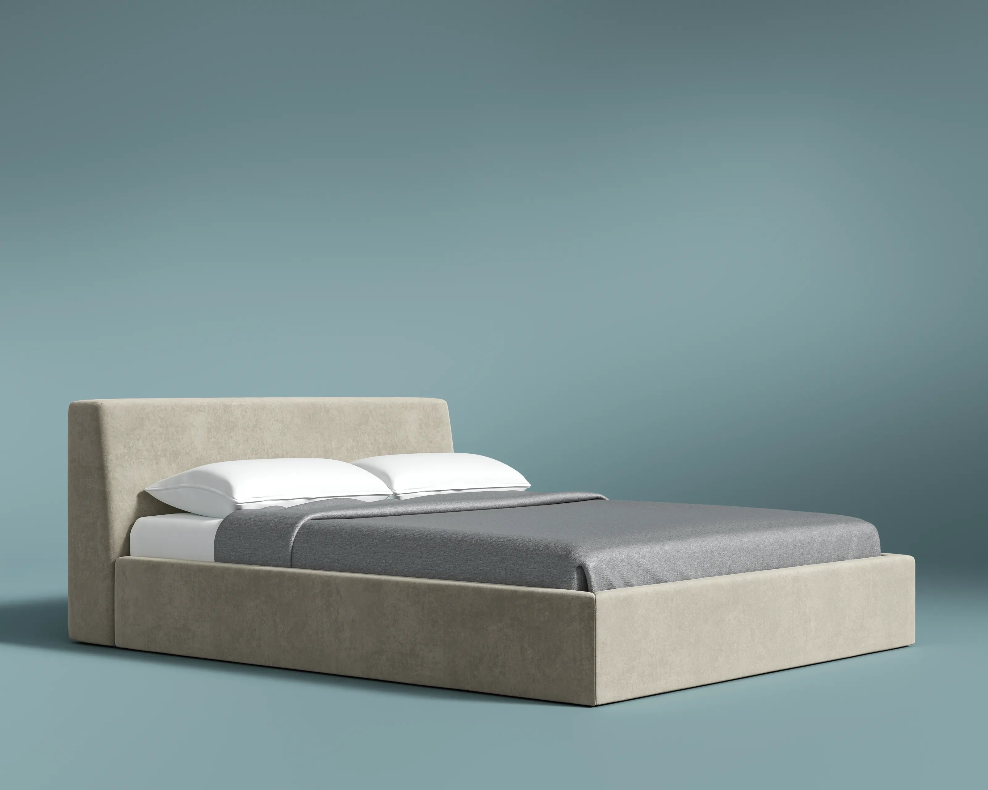 Beige bed with gray bedding against a teal background